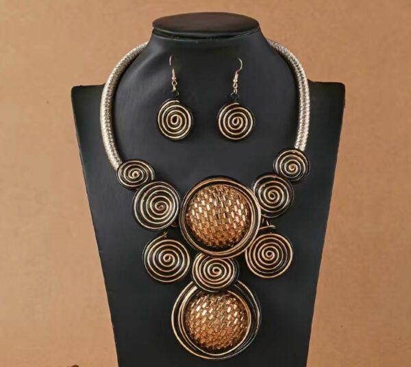 PARURE COLLANA CON SPIRALI DORATA