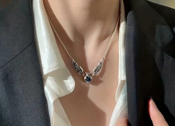 COLLANA CON CUORE E ALI IN ACCIAIO - immagine 2
